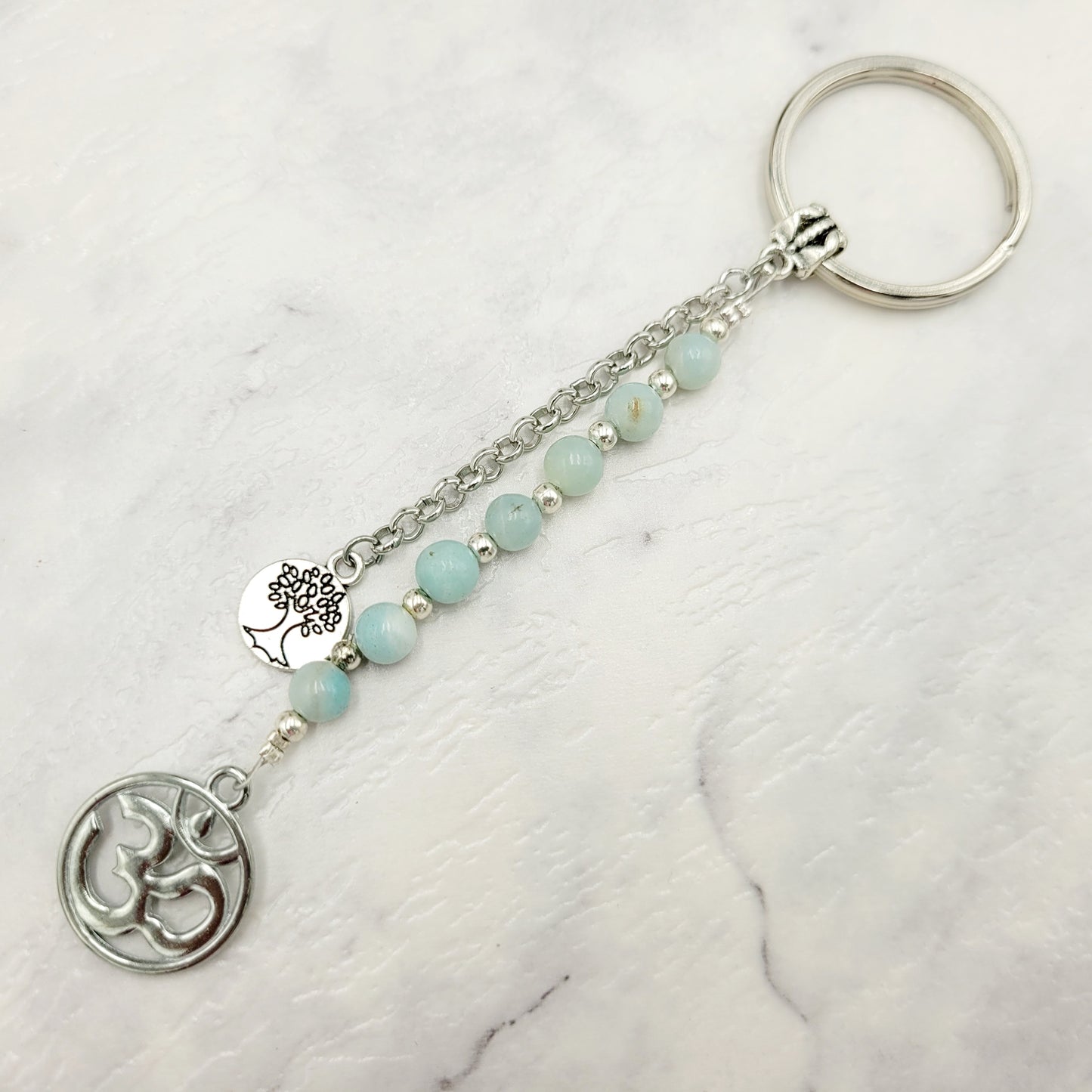 Aquamarine Om Crystal Charm Keyring
