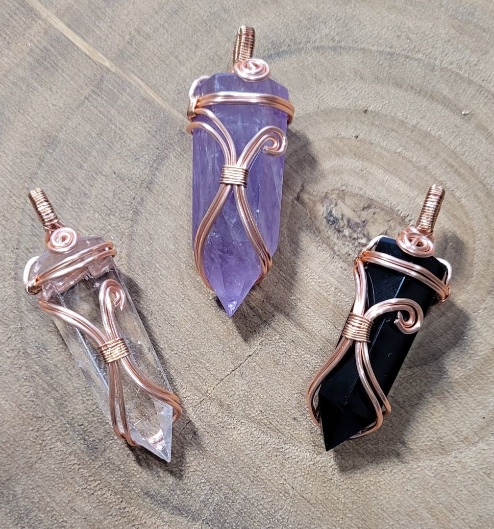 Necklaces Copper wire wrapped with natural Clear Quartz stone pendant.