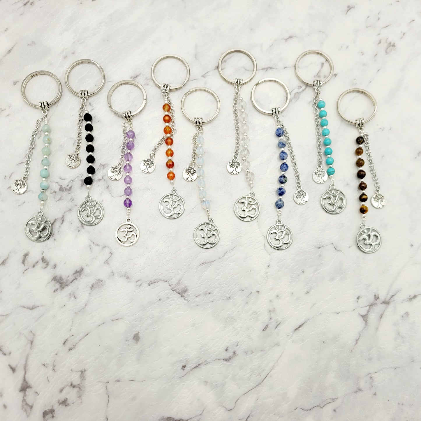 Aquamarine Om Crystal Charm Keyring