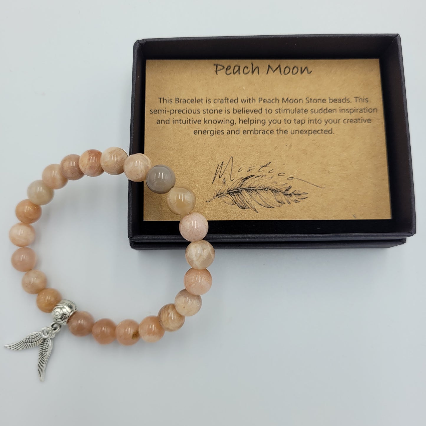 Bracelet Peach Moon stone 8mm Wings
